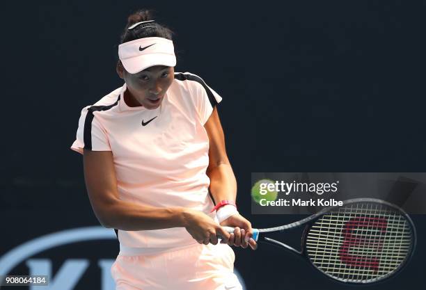 Qinwen Zheng of China plays a backhand against Amber Marshall of Australia during the Australian Open 2018 Junior Championships at Melbourne Park on...