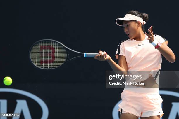 Qinwen Zheng of China plays a forehand against Amber Marshall of Australia during the Australian Open 2018 Junior Championships at Melbourne Park on...