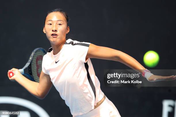 Qinwen Zheng of China plays a forehand against Amber Marshall of Australia during the Australian Open 2018 Junior Championships at Melbourne Park on...