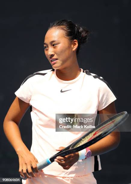 Qinwen Zheng of China looks on against Amber Marshall of Australia during the Australian Open 2018 Junior Championships at Melbourne Park on January...