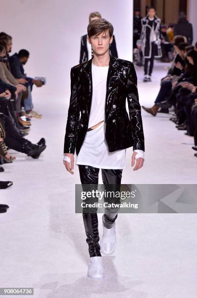 Model walks the runway at the Balmain Homme Autumn Winter 2018 fashion show during Paris Menswear Fashion Week on January 20, 2018 in Paris, France.