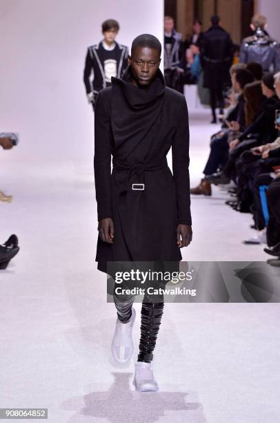 Model walks the runway at the Balmain Homme Autumn Winter 2018 fashion show during Paris Menswear Fashion Week on January 20, 2018 in Paris, France.