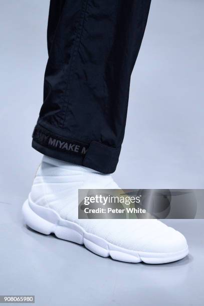 Model, shoe detail, walks the runway during the Issey Miyake Men Menswear Fall/Winter 2018-2019 show as part of Paris Fashion Week on January 18,...