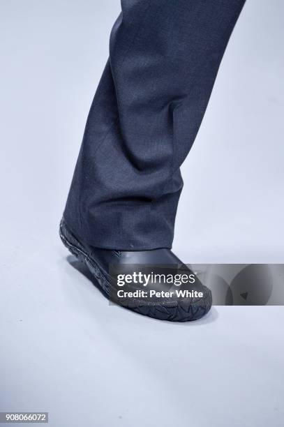 Model, shoe detail, walks the runway during the Issey Miyake Men Menswear Fall/Winter 2018-2019 show as part of Paris Fashion Week on January 18,...