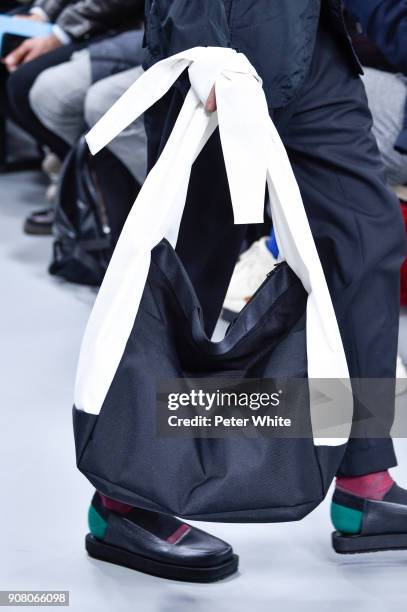 Model, bag detail, walks the runway during the Issey Miyake Men Menswear Fall/Winter 2018-2019 show as part of Paris Fashion Week on January 18, 2018...