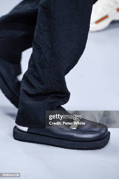 Model, shoe detail, walks the runway during the Issey Miyake Men Menswear Fall/Winter 2018-2019 show as part of Paris Fashion Week on January 18,...