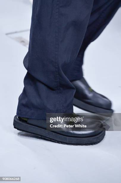 Model, shoe detail, walks the runway during the Issey Miyake Men Menswear Fall/Winter 2018-2019 show as part of Paris Fashion Week on January 18,...