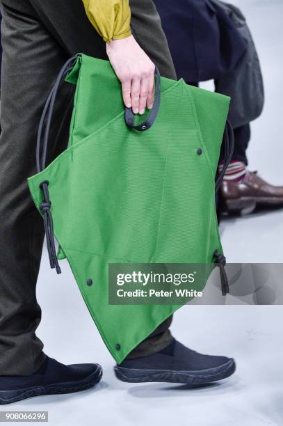 Model, bag detail, walks the runway during the Issey Miyake Men Menswear Fall/Winter 2018-2019 show as part of Paris Fashion Week on January 18, 2018...