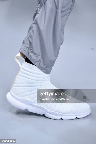 Model, shoe detail, walks the runway during the Issey Miyake Men Menswear Fall/Winter 2018-2019 show as part of Paris Fashion Week on January 18,...