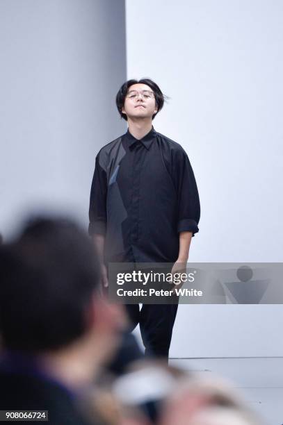 Yusuke Takahashi acknowledges the audience after the Issey Miyake Men Menswear Fall/Winter 2018-2019 show as part of Paris Fashion Week on January...
