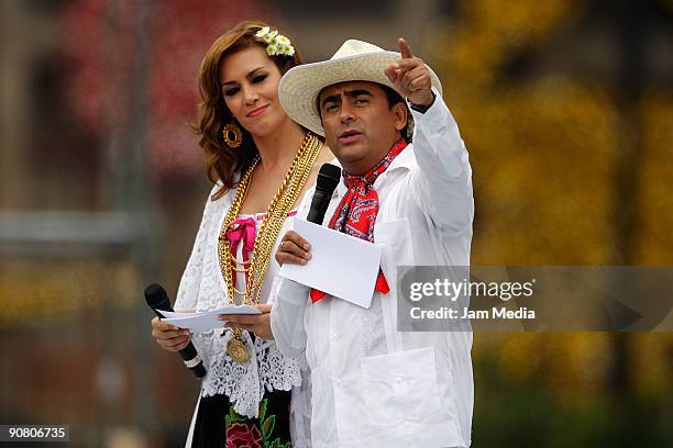 Television hosts Anette Michel and Adal Ramones during the concert of the 199th anniversary of the Mexican Independence at Zocalo on September 15,...