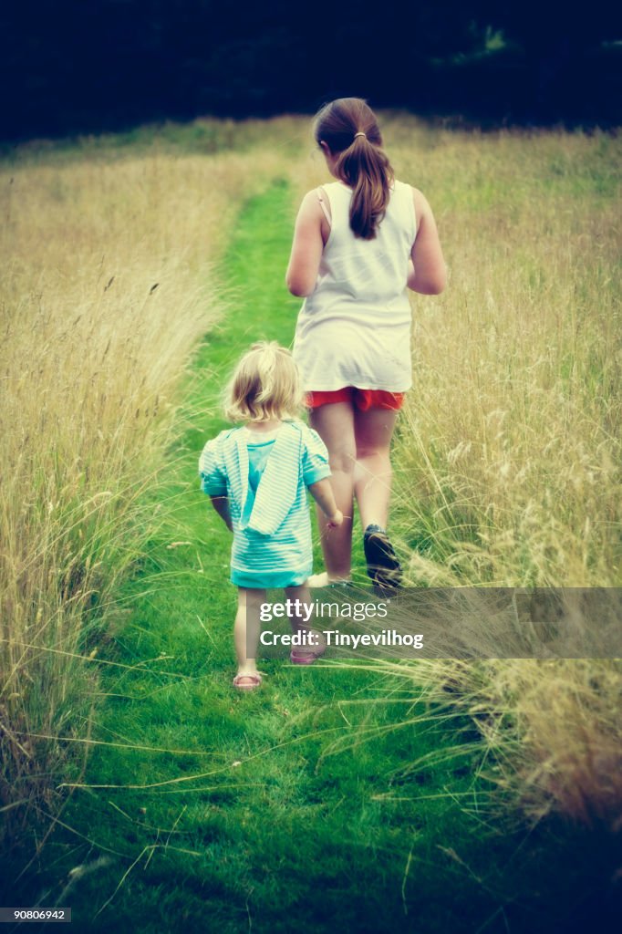 Two children walking