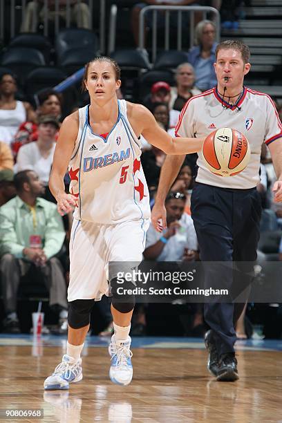 Shalee Lehning of the Atlanta Dream moves the ball against the Sacramento Monarchs during the game at Philips Arena on August 25, 2009 in Atlanta,...