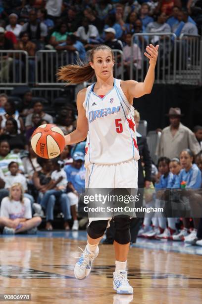 Shalee Lehning of the Atlanta Dream moves the ball against the Los Angeles Sparks during the game at Philips Arena on August 23, 2009 in Atlanta,...