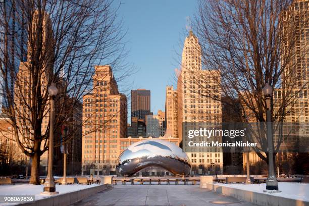 the cloud gate or "bean" at sunrise on a winter day - chicago bean stock pictures, royalty-free photos & images