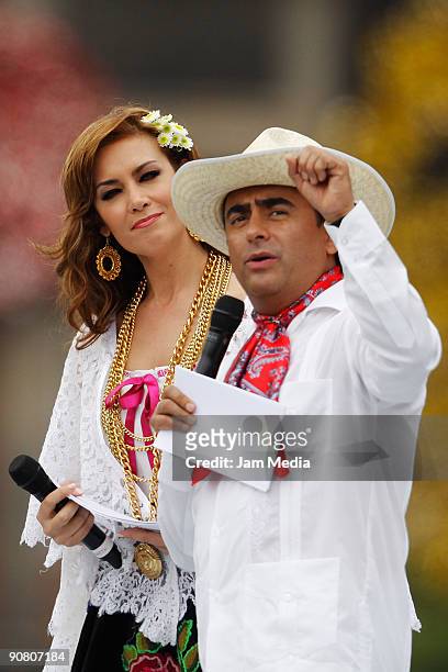 Television hosts Anette Michel and Adal Ramones during the concert of the 199th anniversary of the Mexican Independence at Zocalo on September 15,...