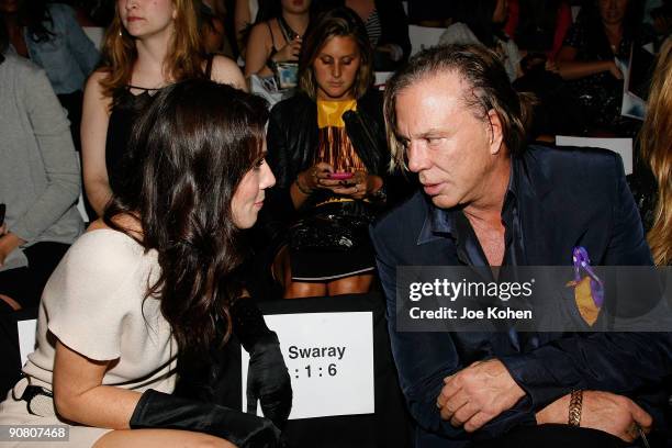 Actress Lynn Collins and Actor Mickey Rourke attend Max Azria Spring 2010 during Mercedes-Benz Fashion Week at Bryant Park on September 15, 2009 in...