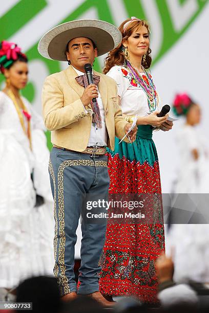Hosts Anette Michel and Adal Ramones during the concert of the 199th anniversary of the Mexican Independence at Zocalo on September 15, 2009 in...