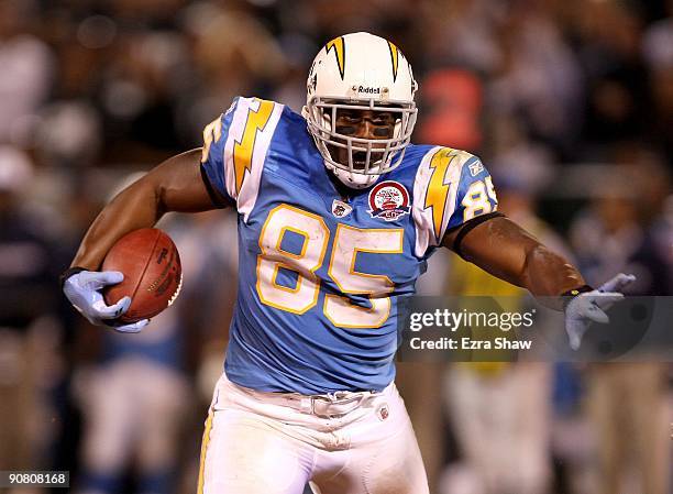 Antonio Gates of the San Diego Chargers runs with the ball during their game against the Oakland Raiders on September 14, 2009 at the Oakland-Alameda...