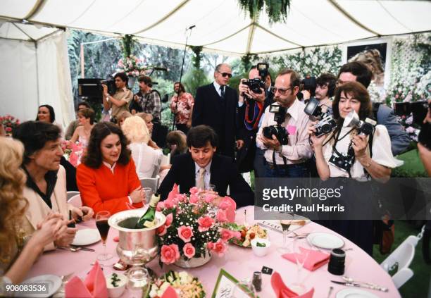 Playboy impresario Hugh Hefner with his daughter, Christie Hefner, at the 'Playmate of the Year' luncheon, May 4, 1982 at the Playboy Mansion West,...