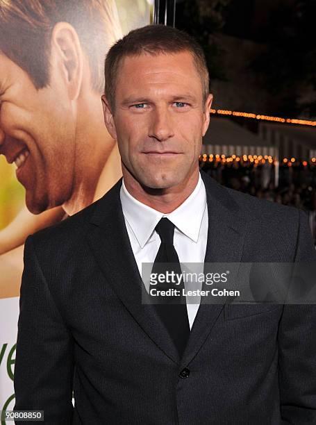 Actor Aaron Eckhart arrives on the red carpet at the Los Angeles premiere of "Love Happens" at the Mann's Village Theatre on September 15, 2009 in...