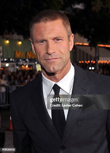 Actor Aaron Eckhart arrives on the red carpet at the Los Angeles premiere of "Love Happens" at the Mann's Village Theatre on September 15, 2009 in...