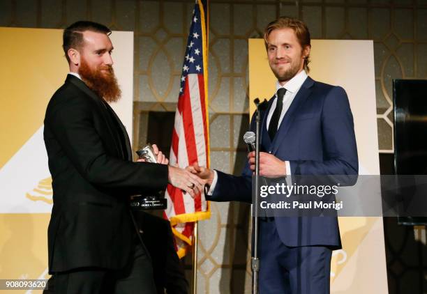 George A. Chewning II, Director of Governmental Affairs, Global on Terror Memorial Foundation, is presented a Vetty Award by actor Matt Barr during...