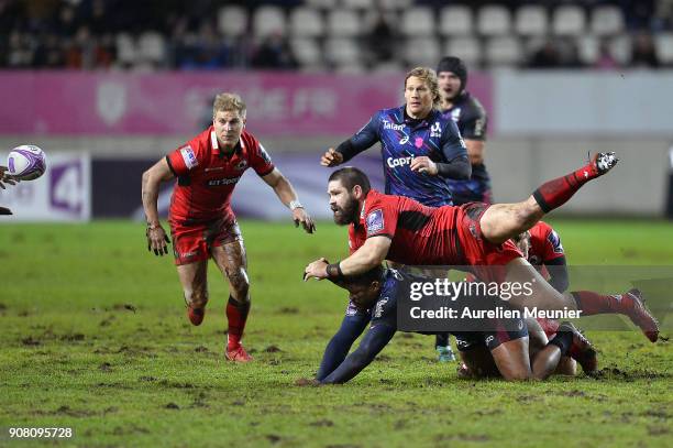 Cornell Du Preez of Edinburgh is tackled during the European Rugby Challenge Cup match between Stade Francais and Edinburgh at Stade Jean-Bouin on...