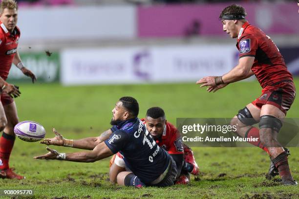 Waisea Nayacalevu of Stade Francais passes the ball during the European Rugby Challenge Cup match between Stade Francais and Edinburgh at Stade...