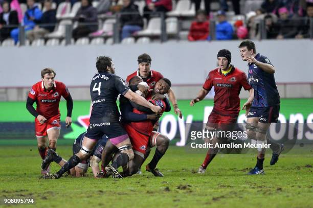 Solomoni Rasolea of Edinburgh is tackled during the European Rugby Challenge Cup match between Stade Francais and Edinburgh at Stade Jean-Bouin on...