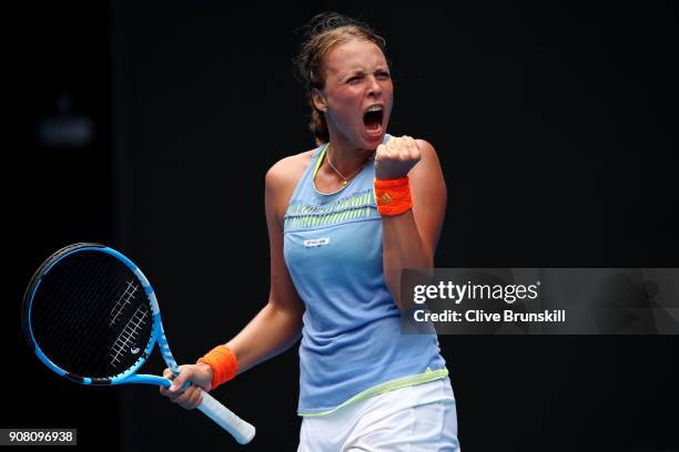 Anett Kontaveit of Estonia celebrates winning a point in her fourth round match against Carla Suarez Navarro of Spain on day seven of the 2018...