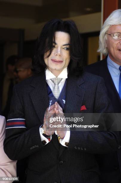 Michael Jackson departs the Santa Barbara County Courthouse following defense testimony in his child molestation trial May 23, 2005 in Santa Maria,...