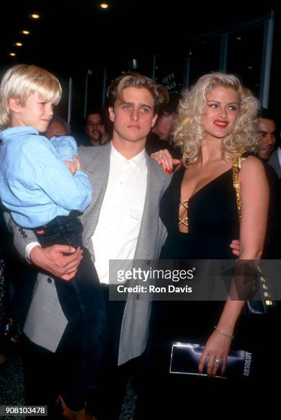 American model and actress Anna Nicole Smith poses with her brother Daniel Ross and son Daniel Smith during the Opening Night Party for 'Guys &...