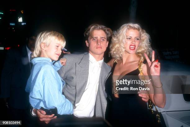 American model and actress Anna Nicole Smith poses with her brother Daniel Ross and son Daniel Smith during the Opening Night Party for 'Guys &...