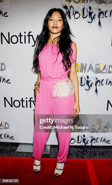 Amerie attends an exhibition hosted by Notify at The Museum of Modern Art on September 15, 2009 in New York City.