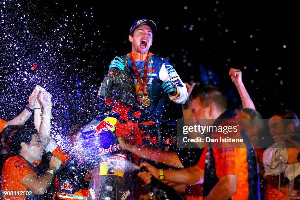 Matthias Walkner of Austria and Red Bull KTM celebrates victory on the podium after stage fourteen of the 2018 Dakar Rally, a loop stage to and from...