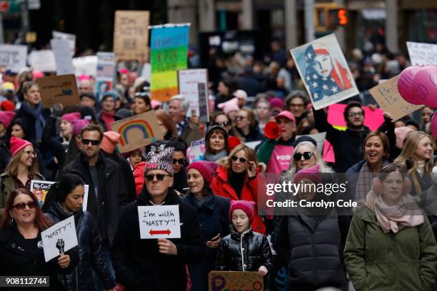 Tens of thousands take part in in the march for women's rights on Saturday, Jan. 20, 2018 in New York on the anniversary of President Trump's...