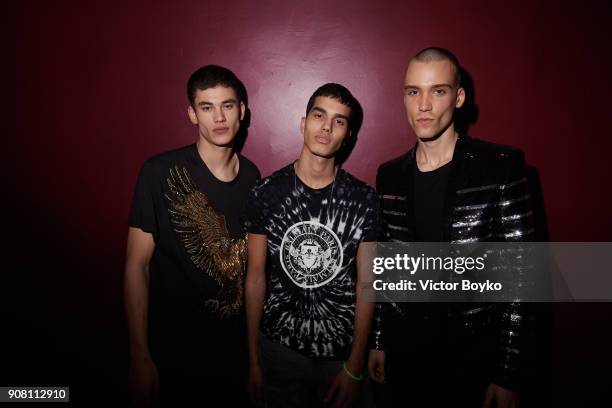 Models from the show attend the Balmain Homme Menswear Fall/Winter 2018-2019 aftershow as part of Paris Fashion Week on January 20, 2018 in Paris,...