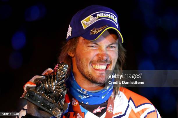 Toby Price of Australia and Red Bull KTM Team celebrates on the podium after stage fourteen of the 2018 Dakar Rally, a loop stage to and from Cordoba...