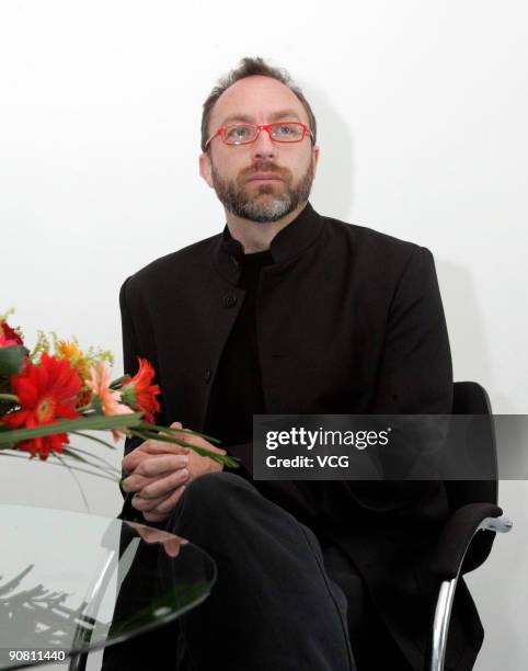 American internet entrepreneur and co-founder of Wikipedia, Jimmy Wales, visits Hudong.com's office during his visit to Beijing on September 15, 2009...