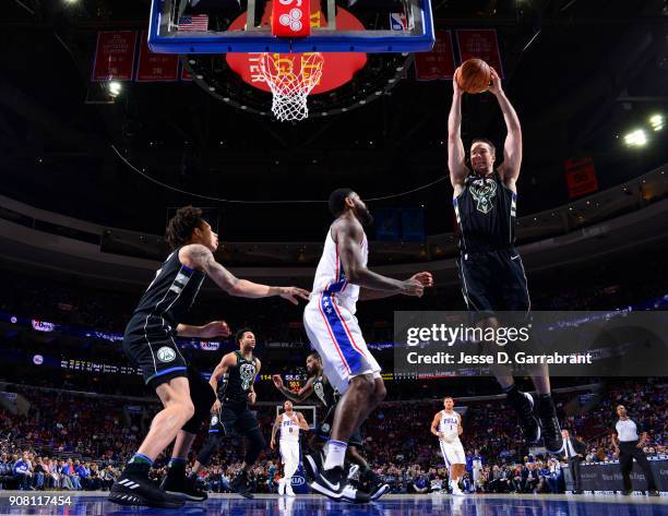 Marshall Plumlee of the Milwaukee Bucks grabs the rebound against the Philadelphia 76ers at Wells Fargo Center on January 20, 2018 in Philadelphia,...