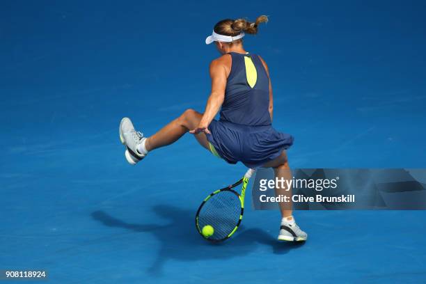 Caroline Wozniacki of Denmark plays a shot through her legs in her fourth round match against Magdalena Rybarikova of Slovakia on day seven of the...