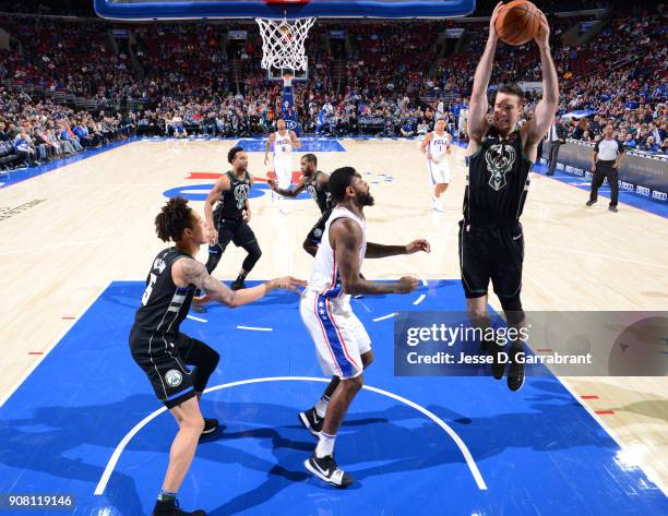 Marshall Plumlee of the Milwaukee Bucks grabs the rebound against the Philadelphia 76ers at Wells Fargo Center on January 20, 2018 in Philadelphia,...