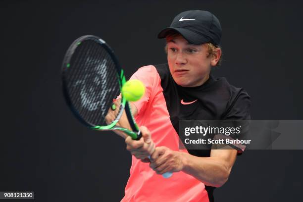 Jack Draper of South Africa plays a backhand against Dalibor Svrcina of the Czech Republic during the Australian Open 2018 Junior Championships at...