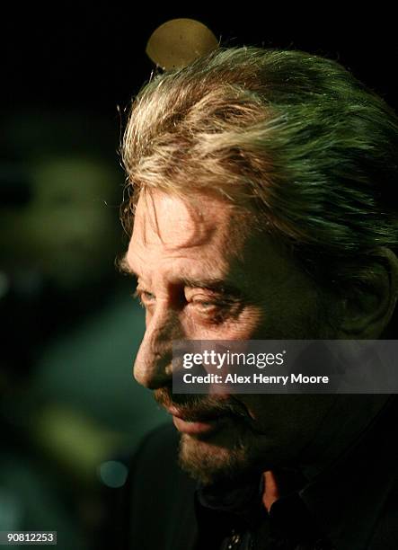 French singer/actor Johnny Hallyday attends the "Vengeance" Premiere held at the Ryerson Theatre during the 2009 Toronto International Film Festival...