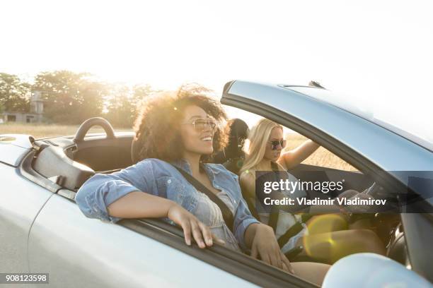 girls traveling with car - driver rider stock pictures, royalty-free photos & images