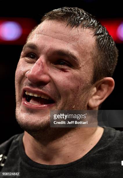Gian Villante celebrates after his victory over Francimar Barroso of Brazil in their light heavyweight bout during the UFC 220 event at TD Garden on...