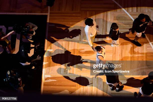 Fletcher Magee guard Wofford College Terriers walks the gauntlet during player introduction before the game against the University of Tennessee...