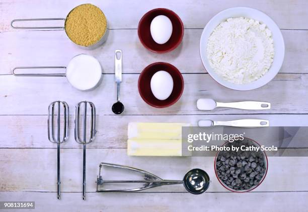 chocolate chip cookie ingredients - measuring spoon stock pictures, royalty-free photos & images