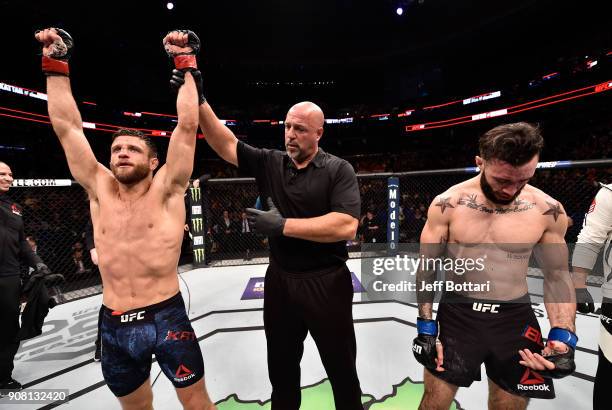 Calvin Kattar celebrates after his knockout victory over Shane Burgos in their featherweight bout during the UFC 220 event at TD Garden on January...